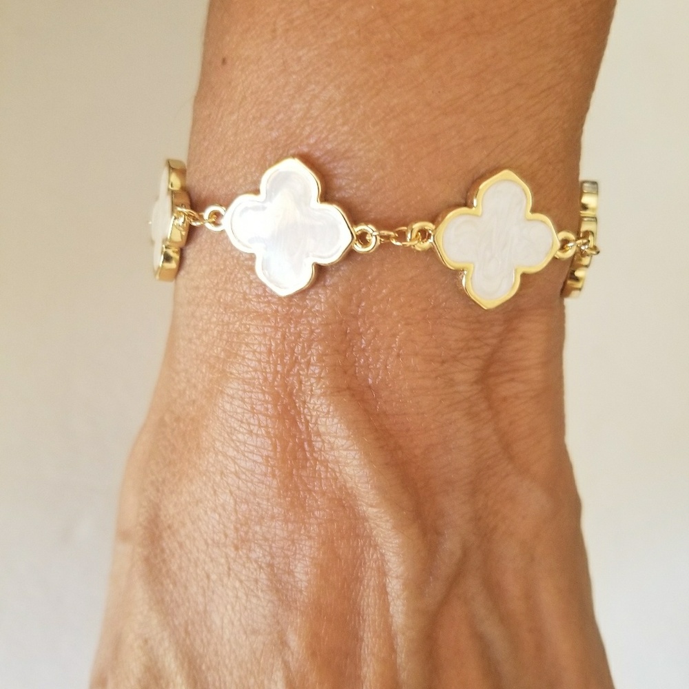 Gold Plated Bracelet,with a white four leaf clover